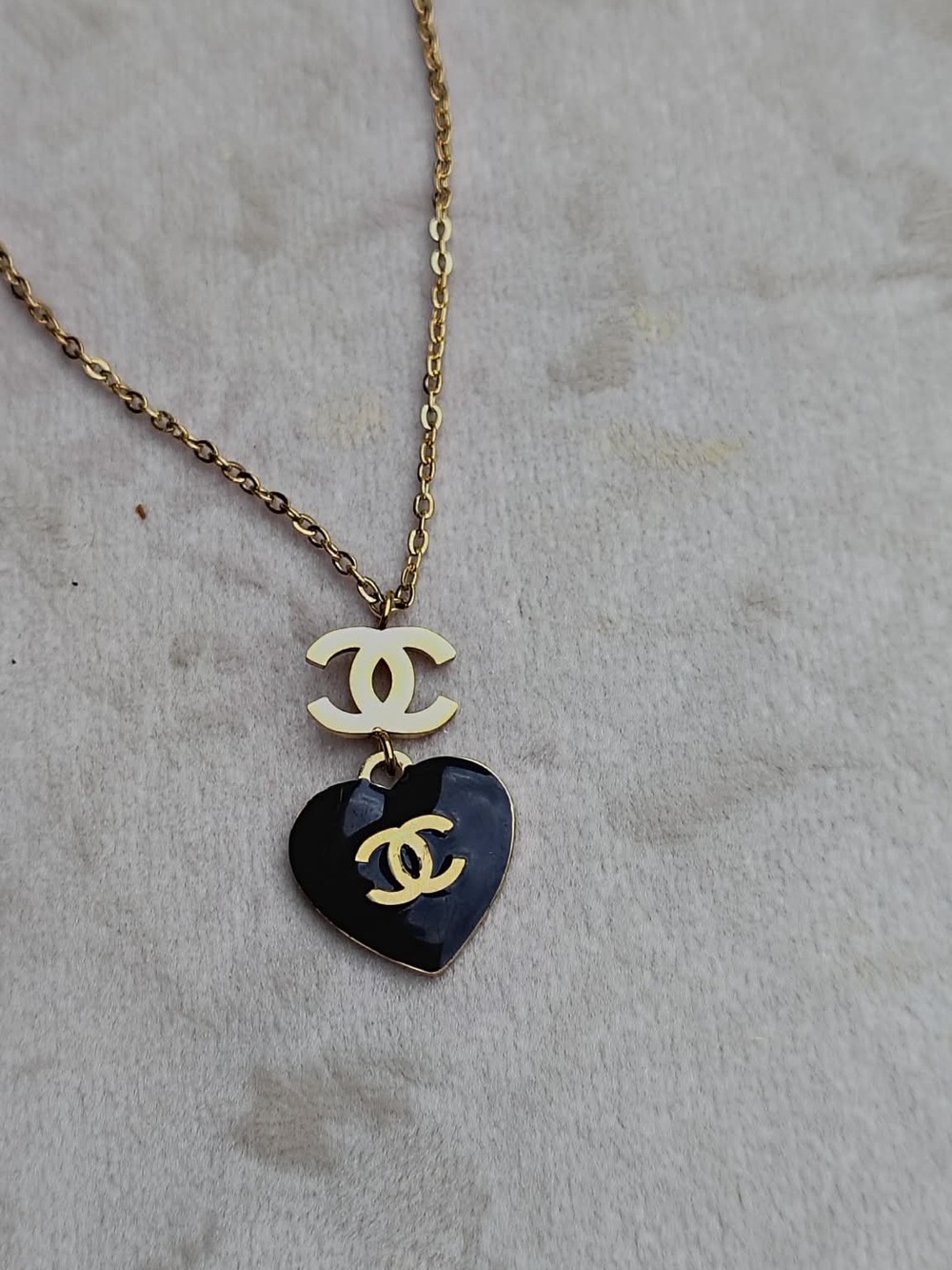 Gold Tone Necklace with Black Heart Pendant